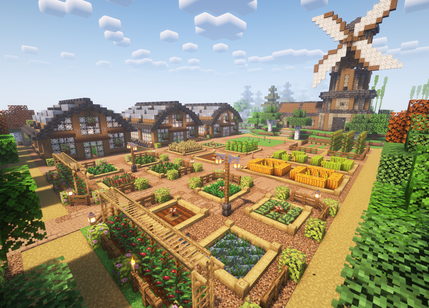 A Sunlit Valley farm and windmill in Minecraft